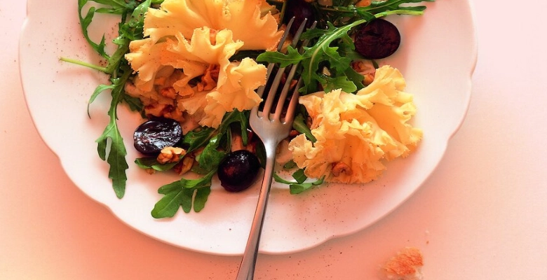 Insalata di rucola bio con Tête de Moine